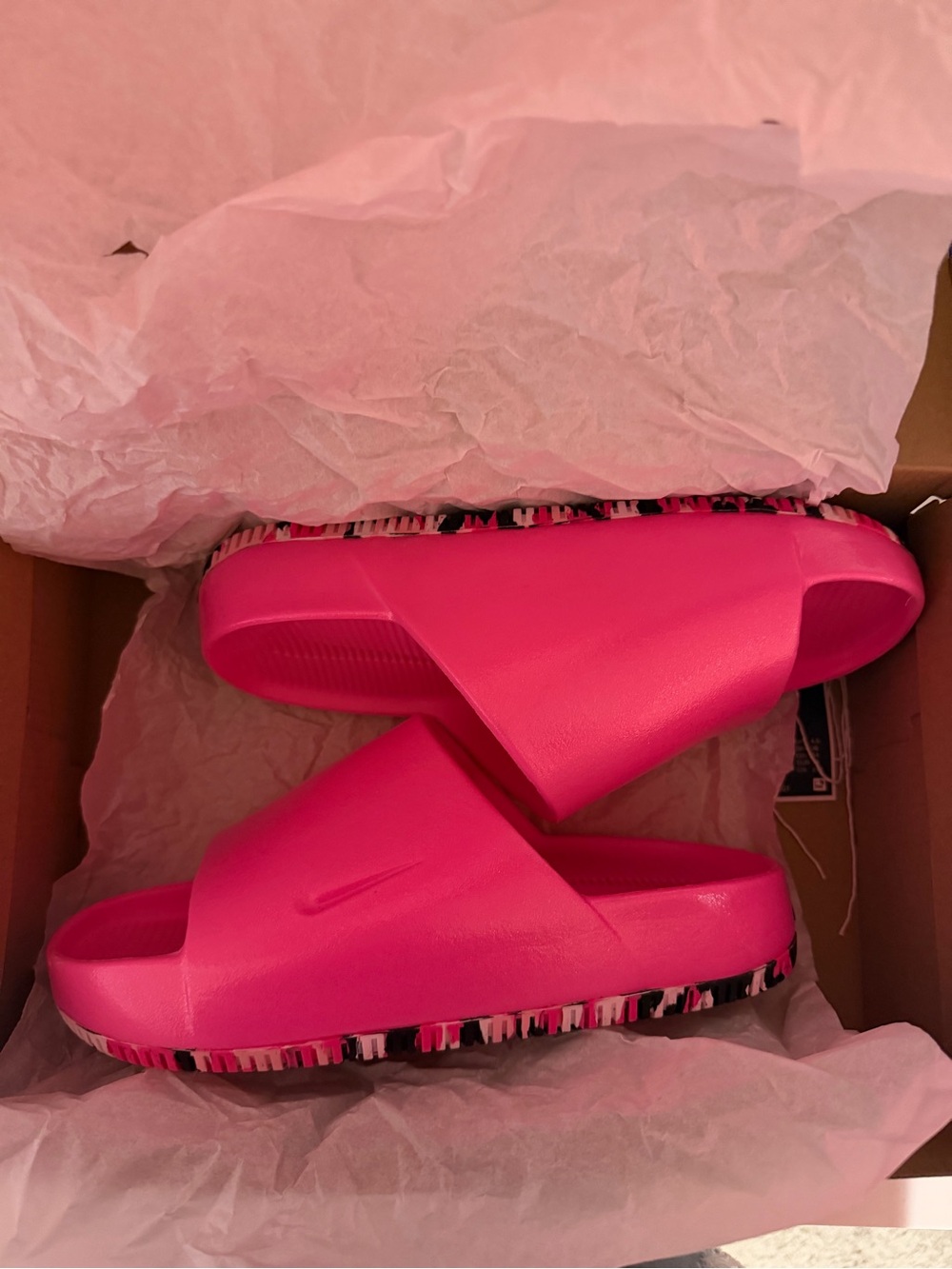 Nike Women’s Hot Pink Slide Sandals with Patterned Sole